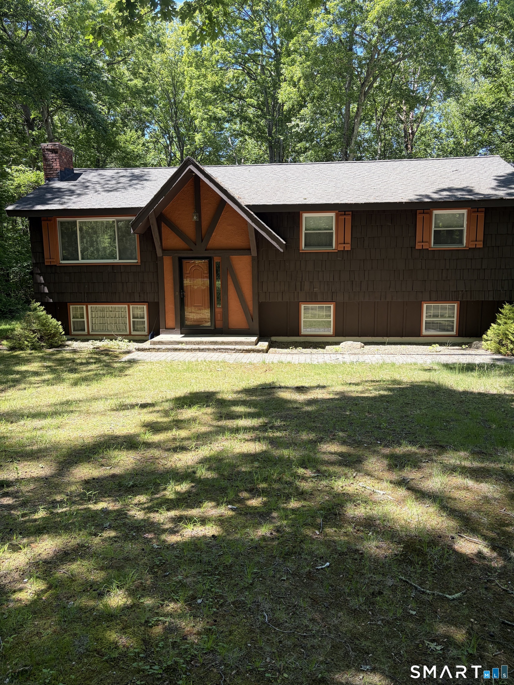 109 Village Hill Road Willington, CT 06279 - Photo 3 of 22 a house view with a garden space