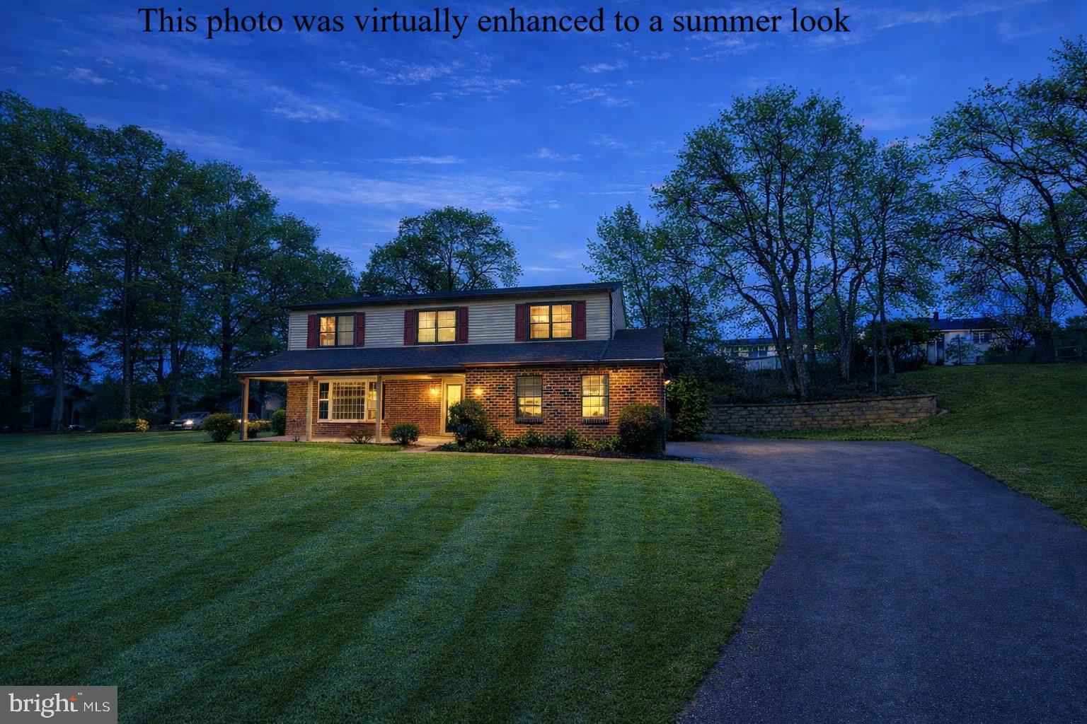 745 Windsor Place Wallingford, PA 19086 - Photo 1 of 33 a view of a park with a house in the background