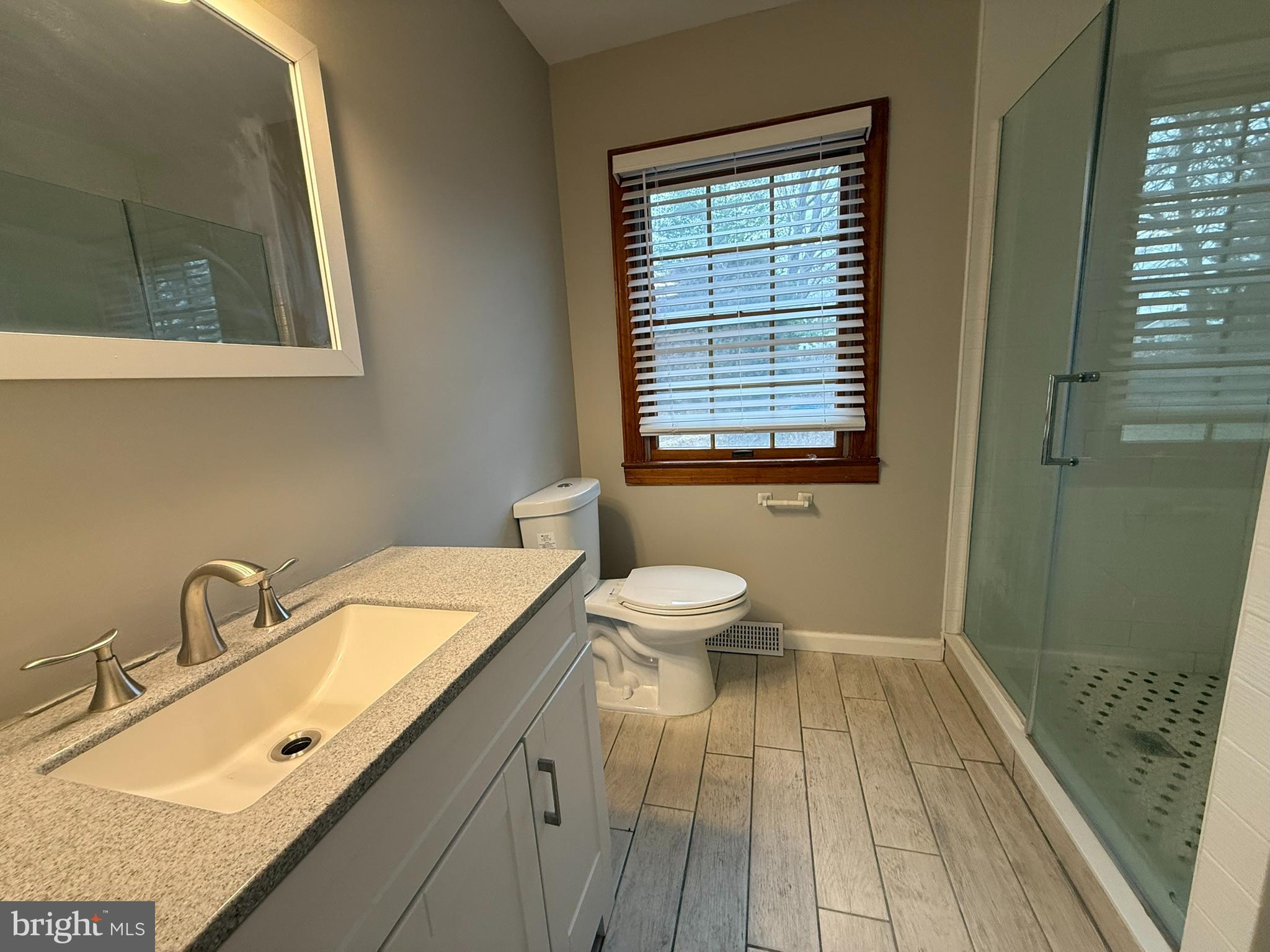 745 Windsor Place Wallingford, PA 19086 - Photo 17 of 33 a bathroom with a sink and a toilet