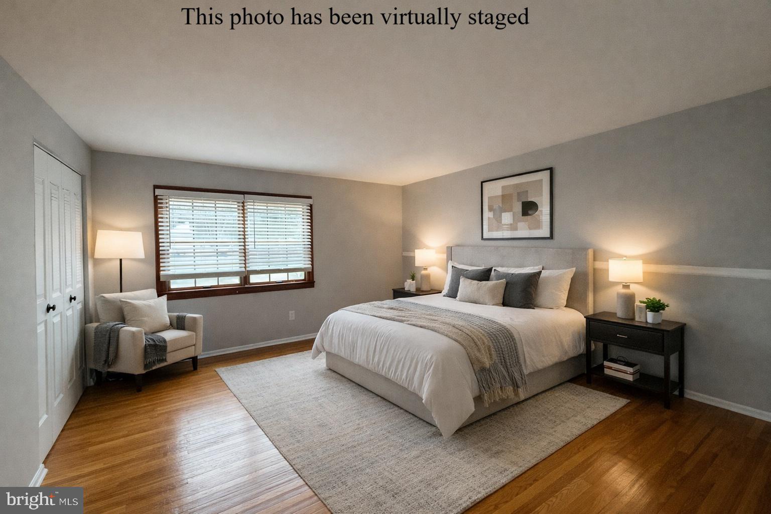 745 Windsor Place Wallingford, PA 19086 - Photo 21 of 33 a spacious bedroom with a bed and a couch