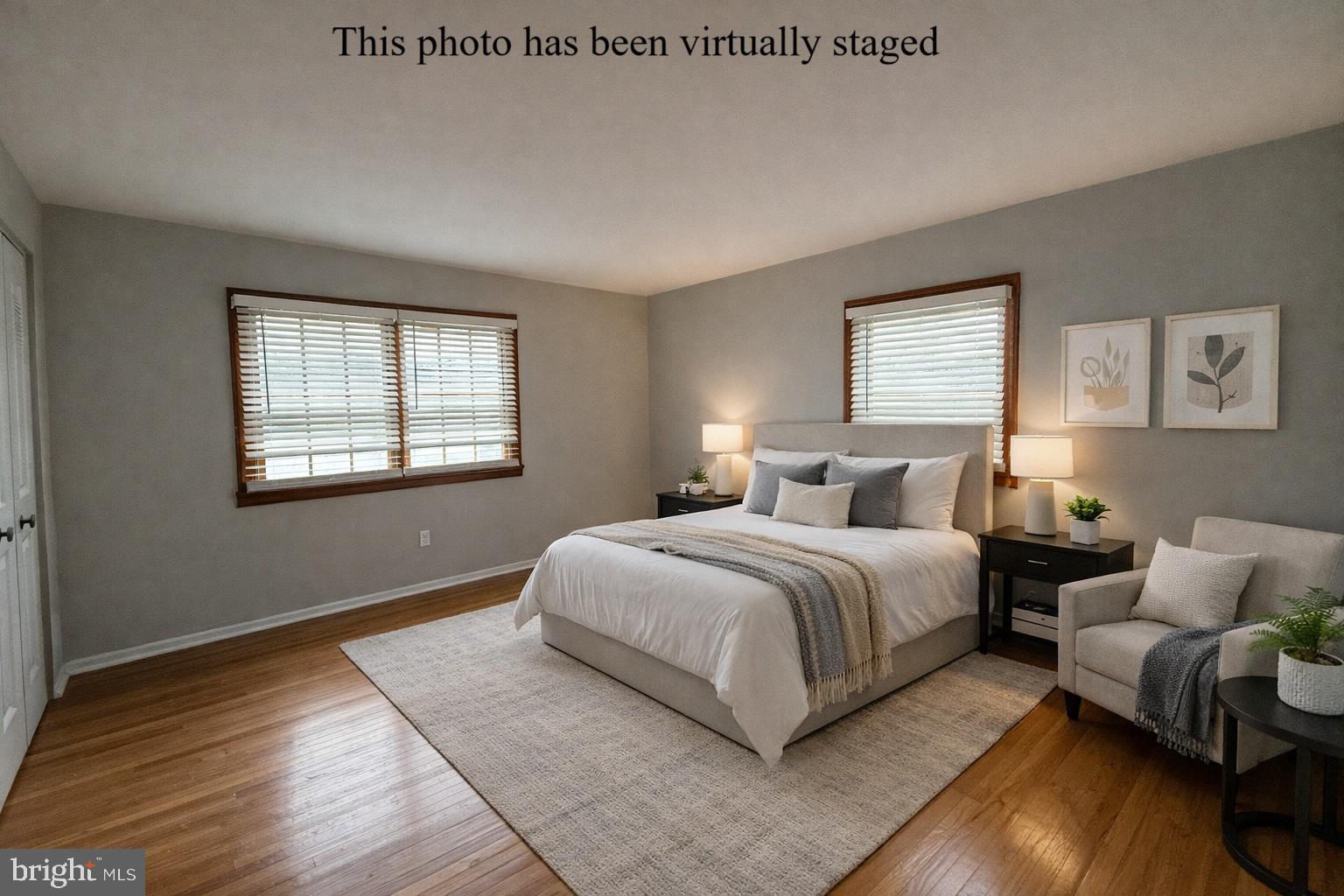 745 Windsor Place Wallingford, PA 19086 - Photo 25 of 33 a spacious bedroom with a bed and wooden floor