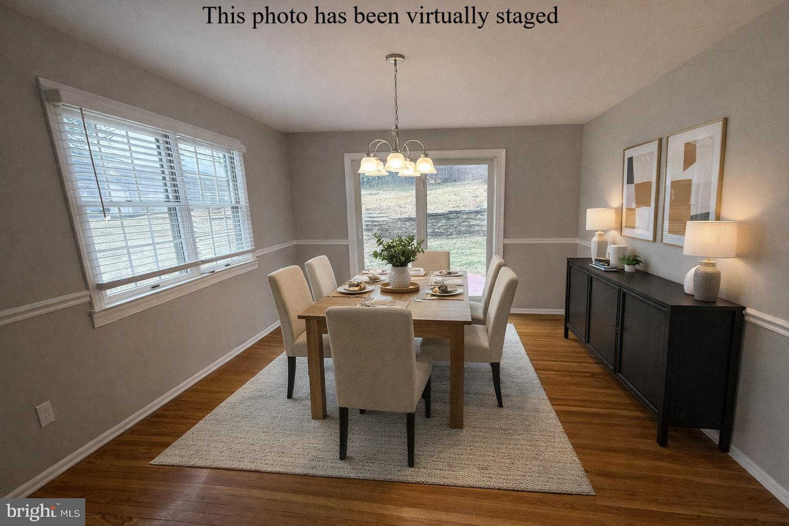 745 Windsor Place Wallingford, PA 19086 - Photo 6 of 33 a dining room with furniture window wooden floor
