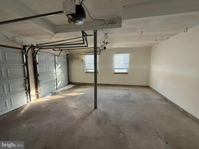 a view of a room with a garage