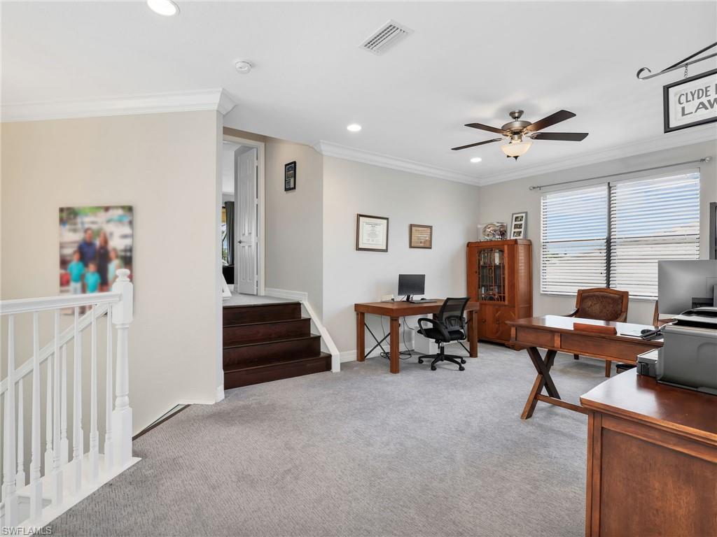 2756 Crystal Way Naples, FL 34119 - Photo 30 of 50 a living room with furniture and a window