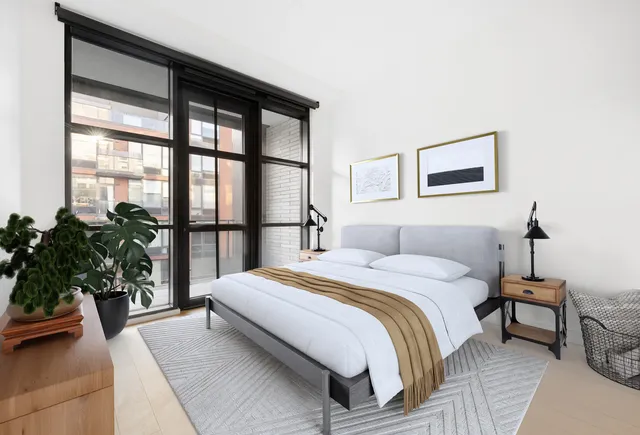 a kitchen with a sink a counter top space and stainless steel appliances