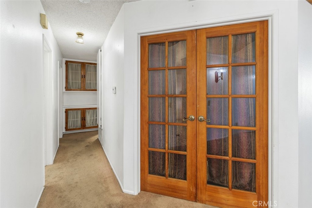 1168 Athena Court Riverside, CA 92507 - Photo 12 of 29 Hallway to Private Areas