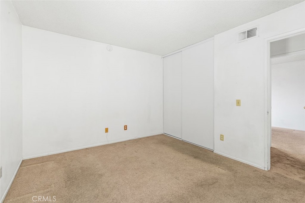 1168 Athena Court Riverside, CA 92507 - Photo 13 of 29 Primary Bedroom entrance from hallway