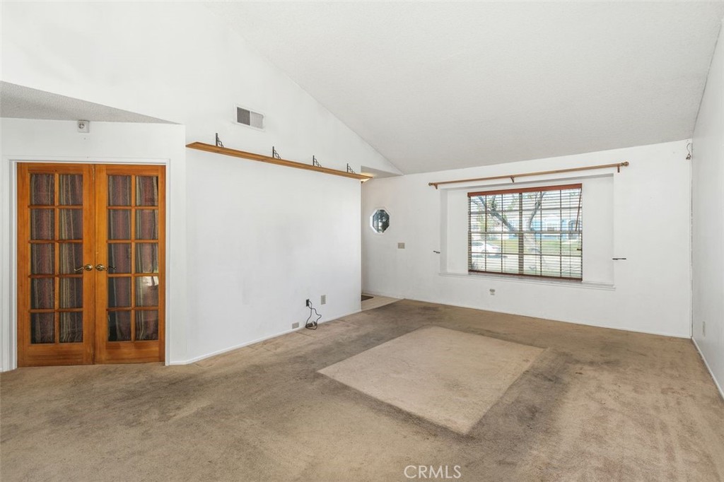 1168 Athena Court Riverside, CA 92507 - Photo 18 of 29 French doors leading directly into what could function as either a comfortable secondary bedroom or a functional office space.