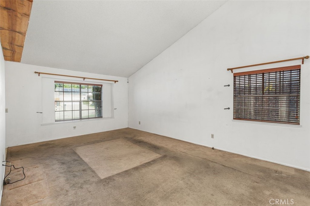 1168 Athena Court Riverside, CA 92507 - Photo 6 of 29 Warm inviting sunlit living room featuring natural light streaming through the windows.