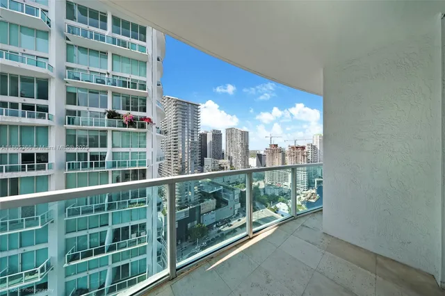 a view of city from a balcony