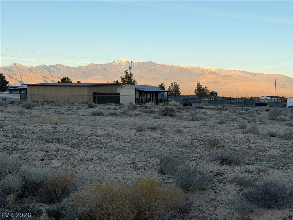 10391 Vicki Ann Road Pahrump, NV 89048 - Photo 2 of 6 Future Backyard Patio Sunrise View>