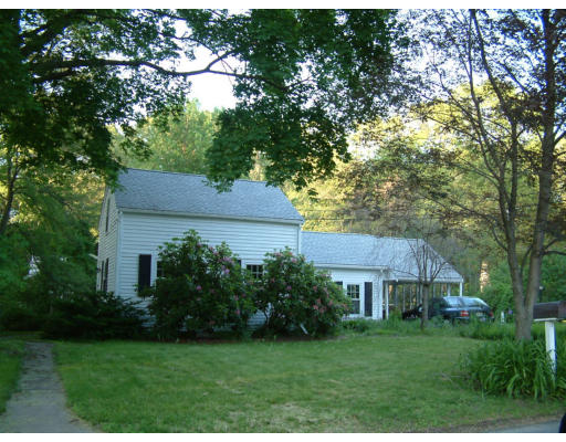 79 Reed Street Lexington, MA 02421 - Photo 1 of 1 a house view with a garden space