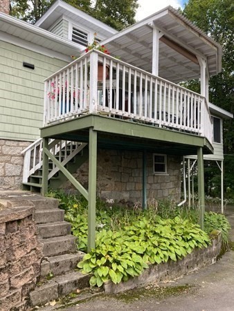 23 Colonial Road Worcester, MA 01602 - Photo 5 of 14 front view of a house with a balcony