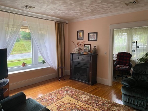 23 Colonial Road Worcester, MA 01602 - Photo 10 of 14 a bedroom with furniture and a window
