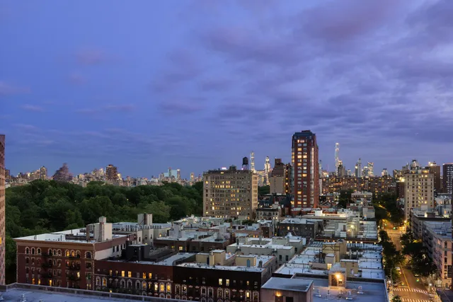 a bathroom with a sink a toilet and bathtub