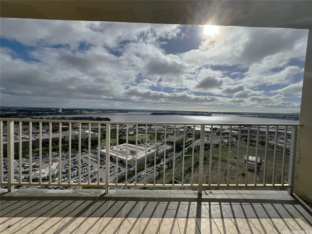 a view of balcony with wooden floor