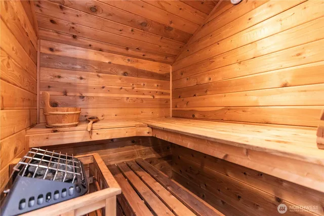 a bathroom with a bathtub and shower