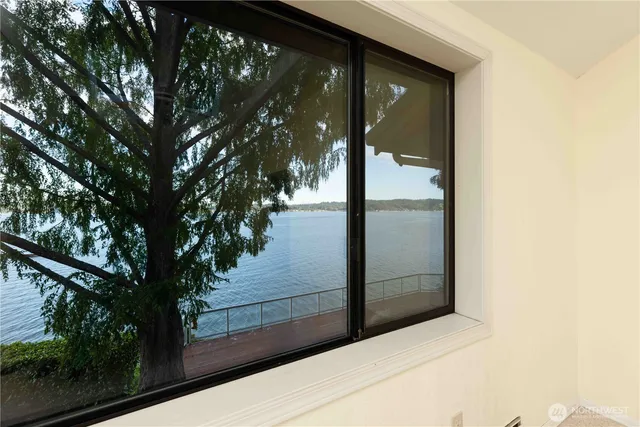 an aerial view of a house with a yard and garden