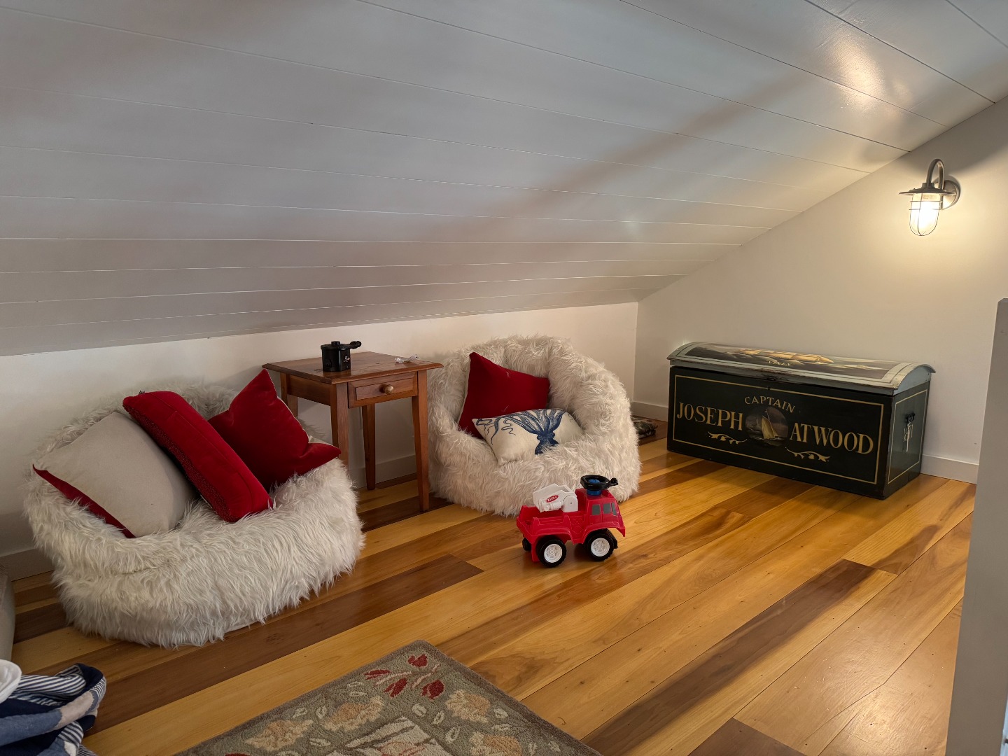 16 H Milestone Road, Unit 8 DIONIS Nantucket, MA 02554 - Photo 20 of 22 a living room with furniture and a wooden floor