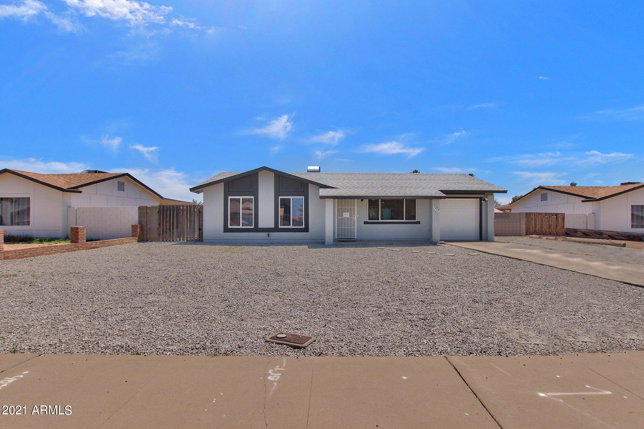 7413 West Hatcher Road Peoria, AZ 85345 - Photo 1 of 28 02