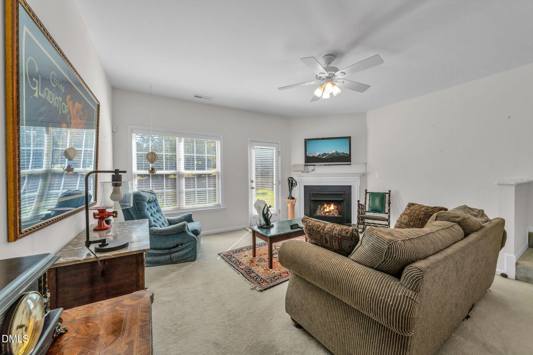2140 Thornblade Drive Raleigh, NC 27604 - Photo 13 of 48 a living room with furniture and a fireplace
