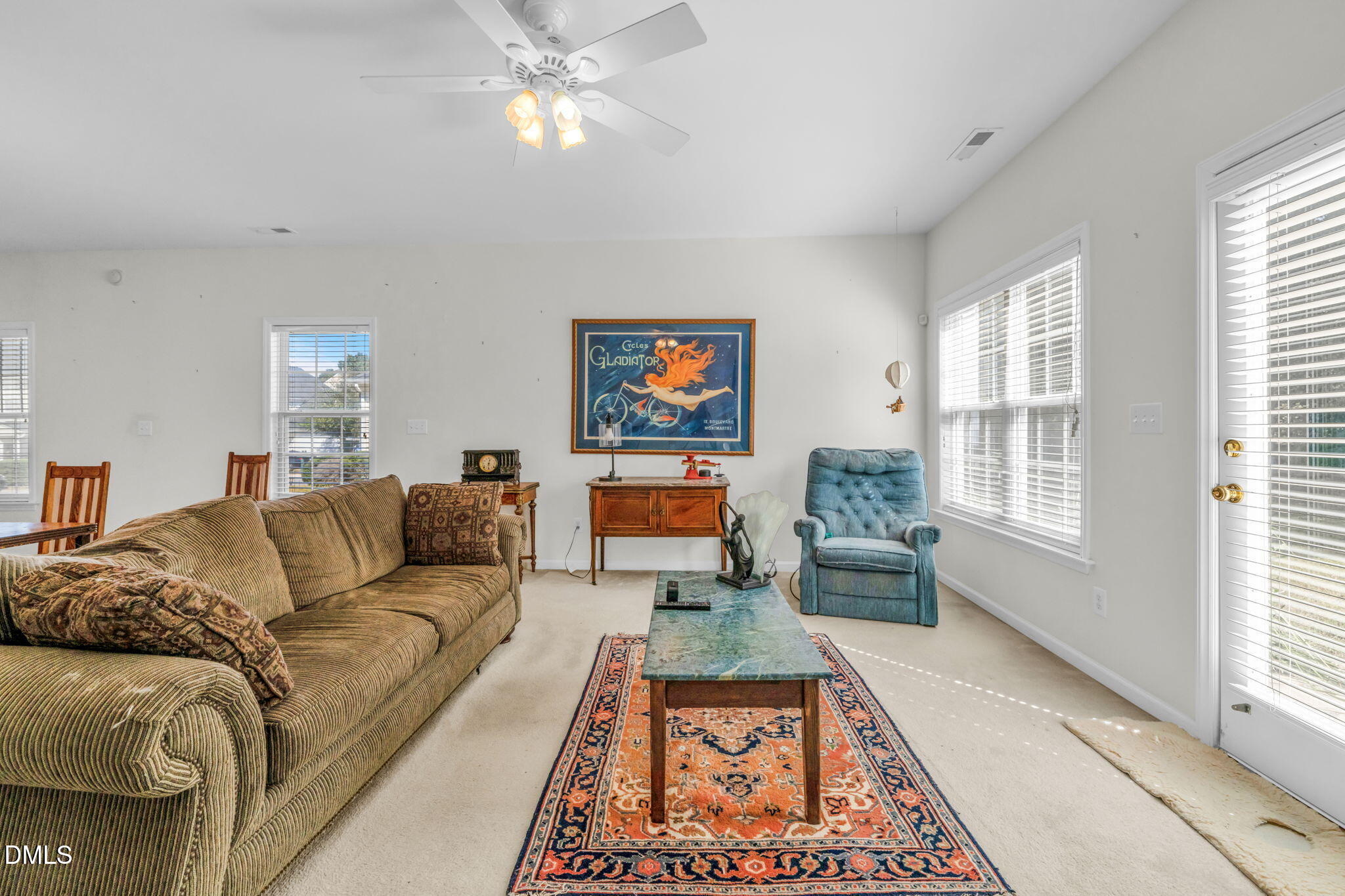 2140 Thornblade Drive Raleigh, NC 27604 - Photo 15 of 48 a living room with furniture and a rug