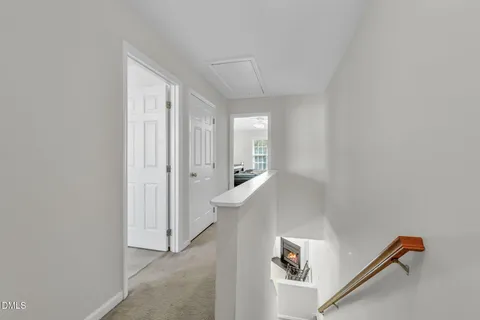 an entryway with a white walls