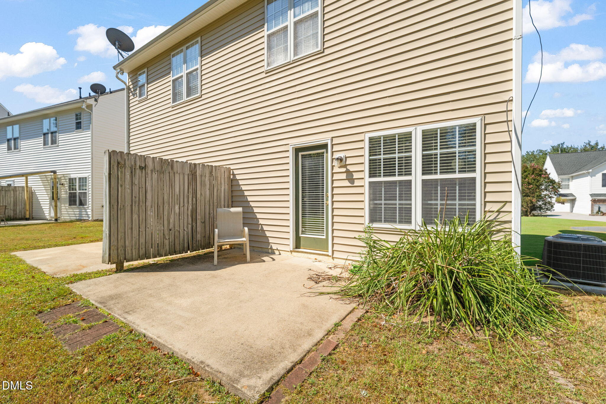 2140 Thornblade Drive Raleigh, NC 27604 - Photo 35 of 48 a view of a backyard with a chair and potted plants