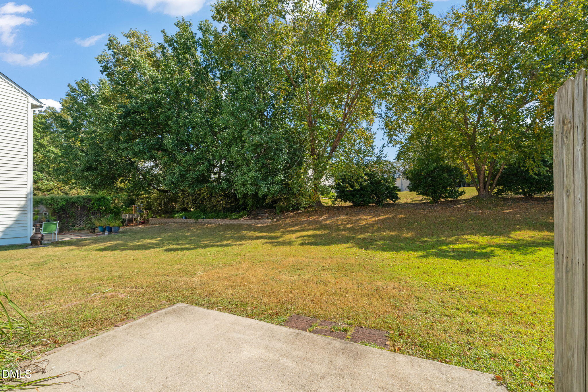 2140 Thornblade Drive Raleigh, NC 27604 - Photo 36 of 48 a view of a swimming pool with an outdoor space and seating area