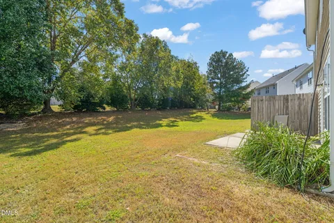 a view of a swimming pool with an outdoor space and seating area
