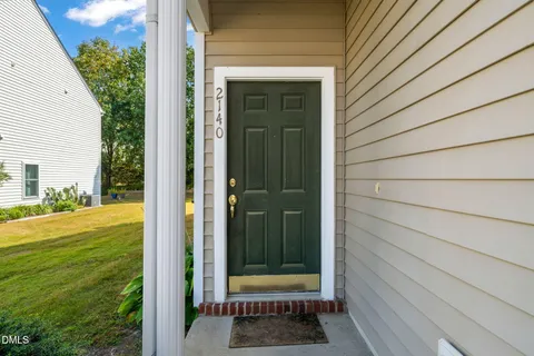 a view of a door and a window