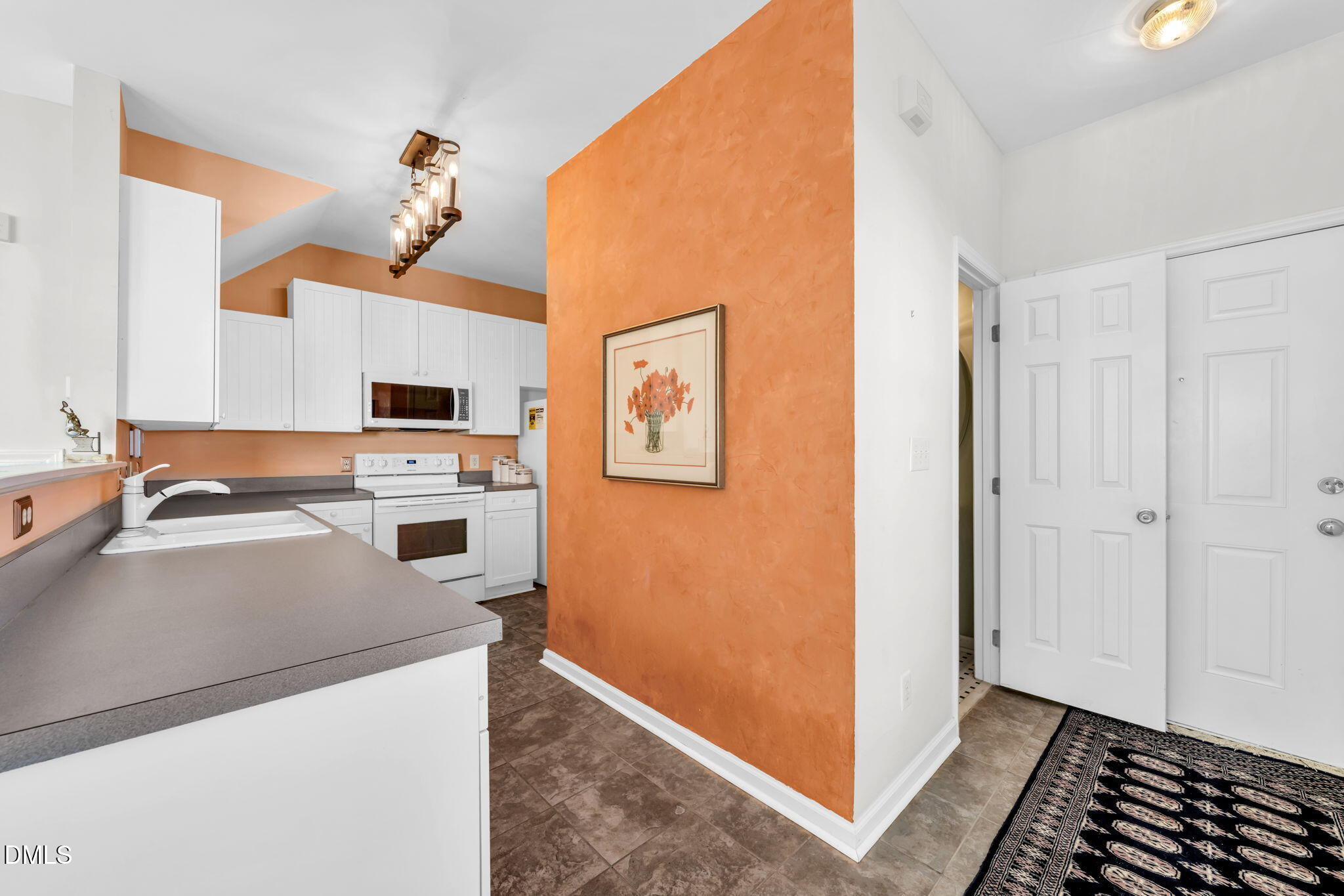 2140 Thornblade Drive Raleigh, NC 27604 - Photo 5 of 48 a view of a kitchen with appliances and cabinets