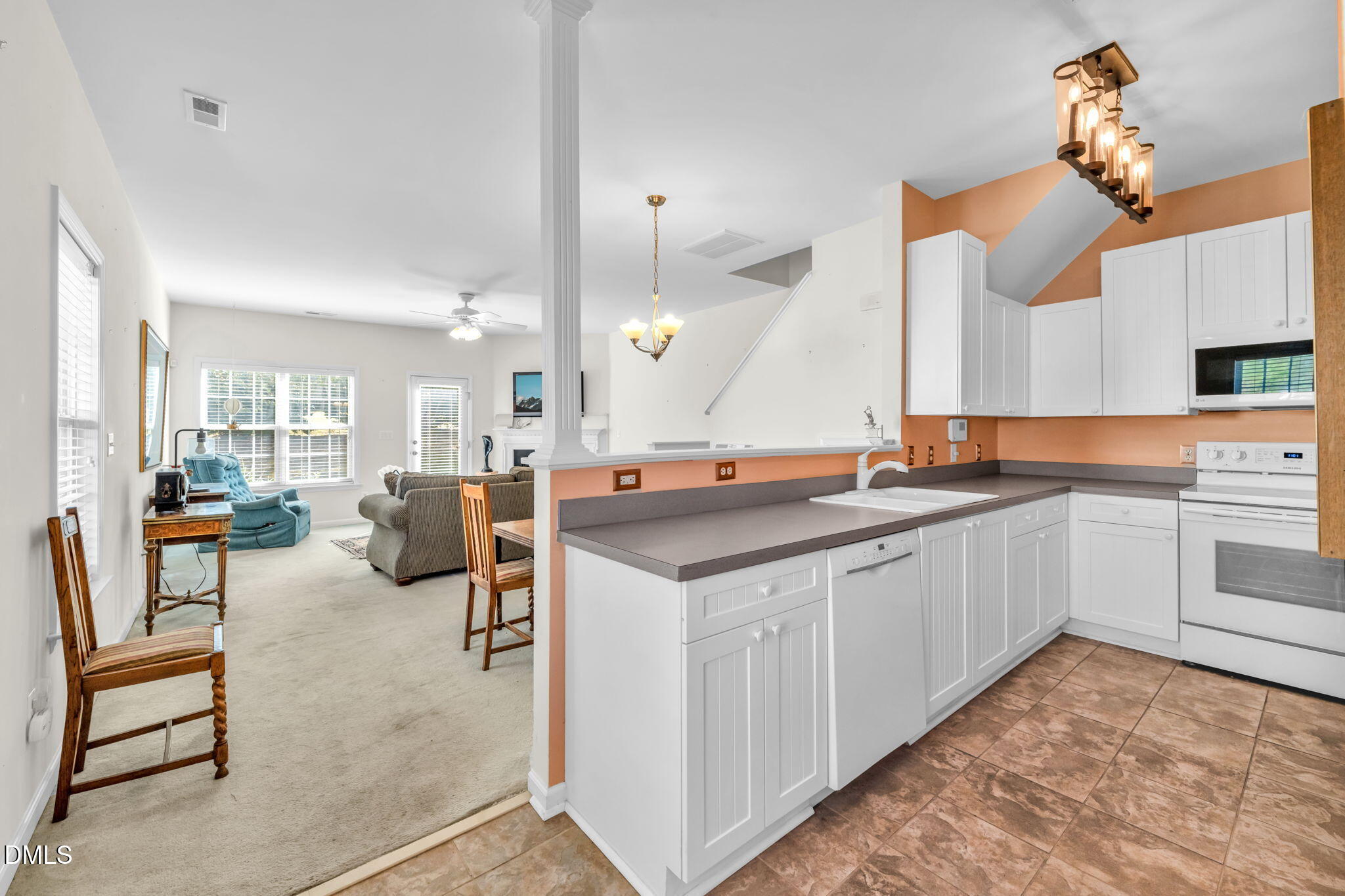 2140 Thornblade Drive Raleigh, NC 27604 - Photo 9 of 48 a large kitchen with a table and chairs