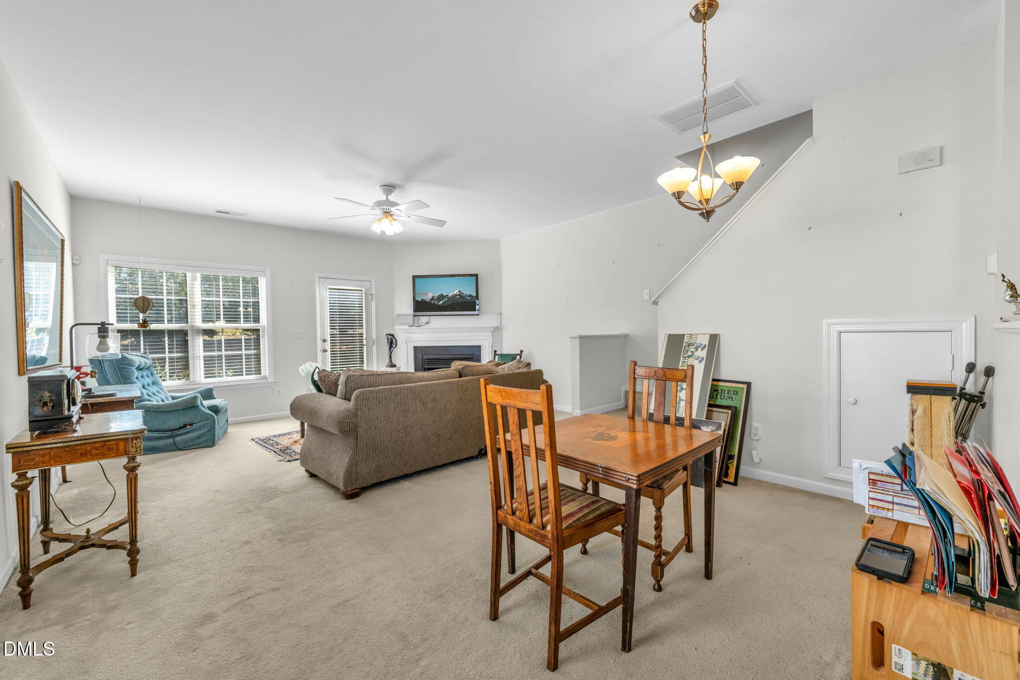 2140 Thornblade Drive Raleigh, NC 27604 - Photo 10 of 48 a view of a livingroom with furniture and a ceiling fan