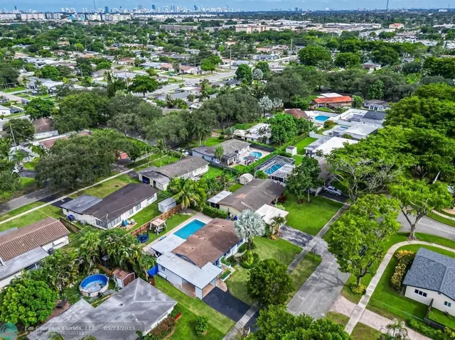 an aerial view of a city with lots of residential buildings