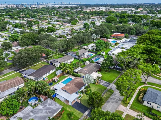 an aerial view of a city with lots of residential buildings