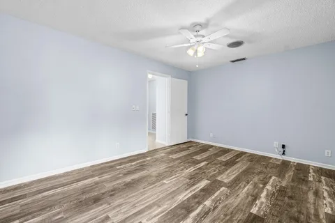 a view of a livingroom with a workspace