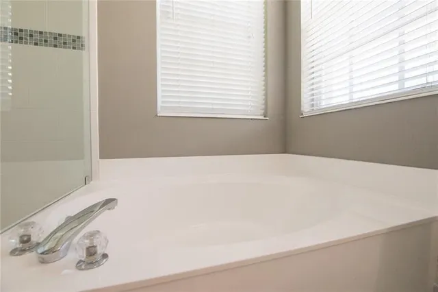 a bathroom with a bathtub