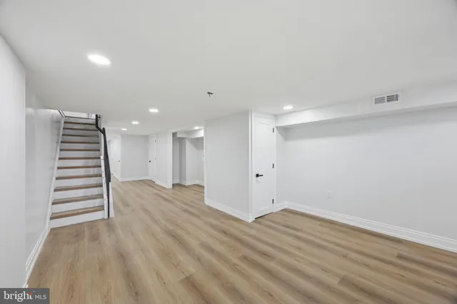 a view of entryway with wooden floor