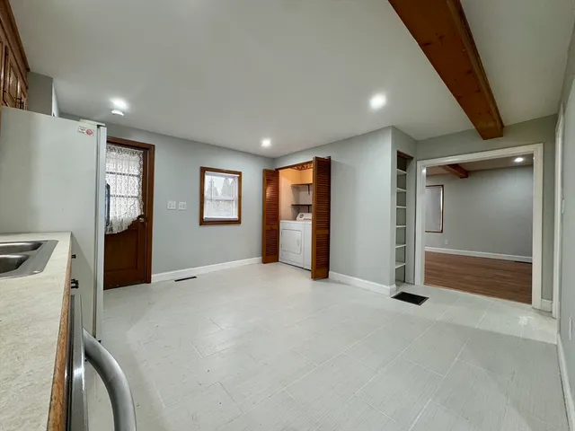 a view of an empty room and window