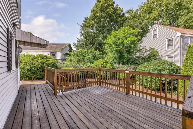 a view of a wooden roof deck