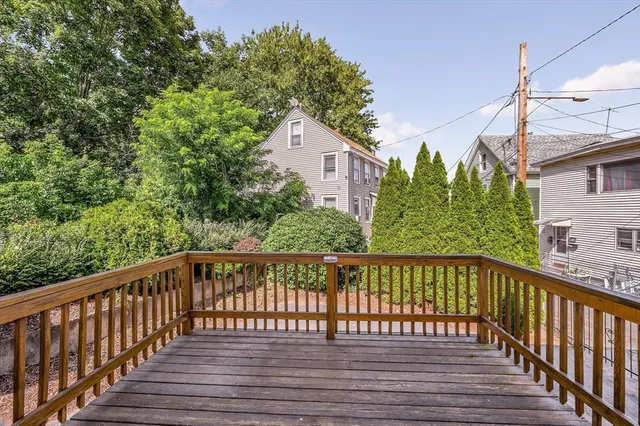 a view of a wooden street from a balcony