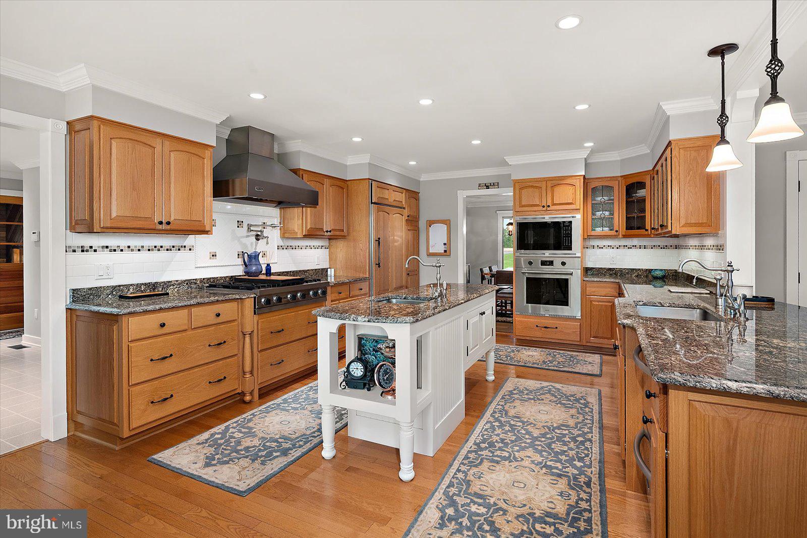 33915 Shockley Road Parsonsburg, MD 21849 - Photo 50 of 125 Elegant kitchen with rich wood tones.