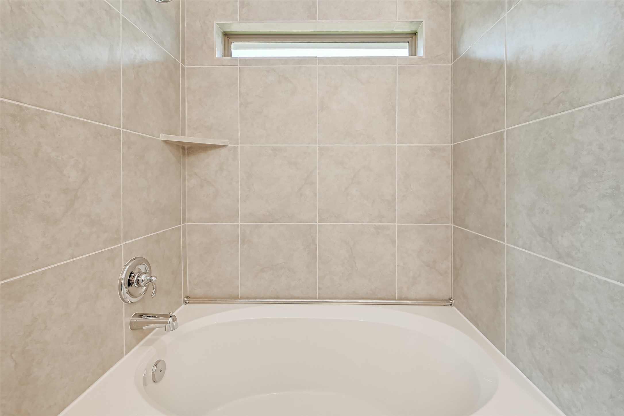 3106 Rising Fir Lane Conroe, TX 77385 - Photo 16 of 32 a bathroom with a bathtub