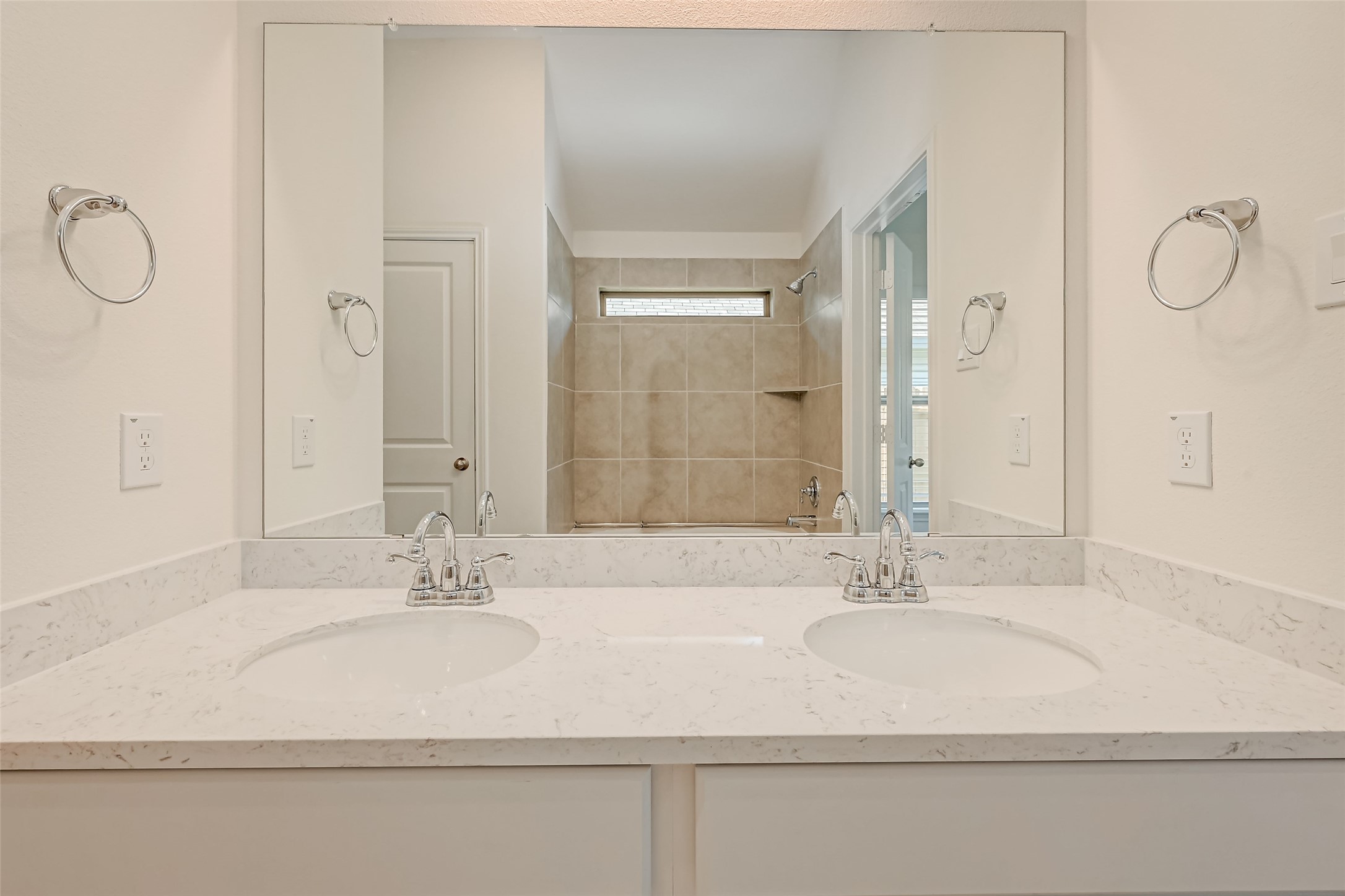 3106 Rising Fir Lane Conroe, TX 77385 - Photo 18 of 32 a bathroom with a sink and a mirror