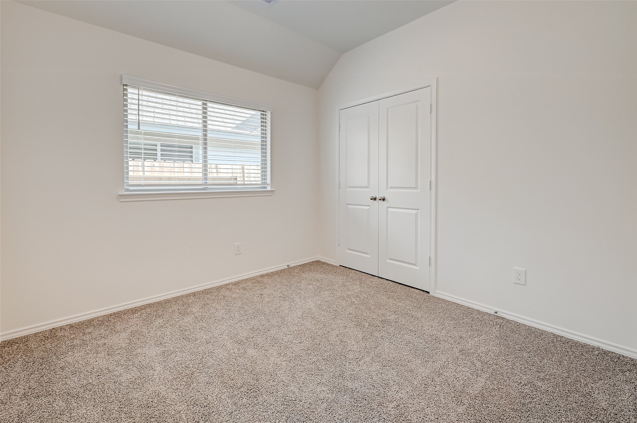 3106 Rising Fir Lane Conroe, TX 77385 - Photo 22 of 32 an empty room with windows