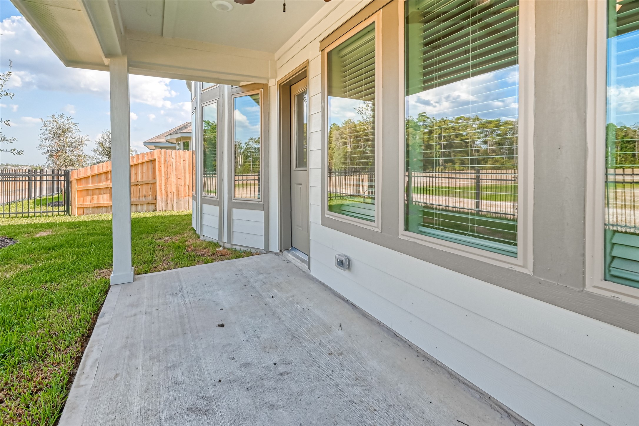 3106 Rising Fir Lane Conroe, TX 77385 - Photo 28 of 32 a view of porch with a yard