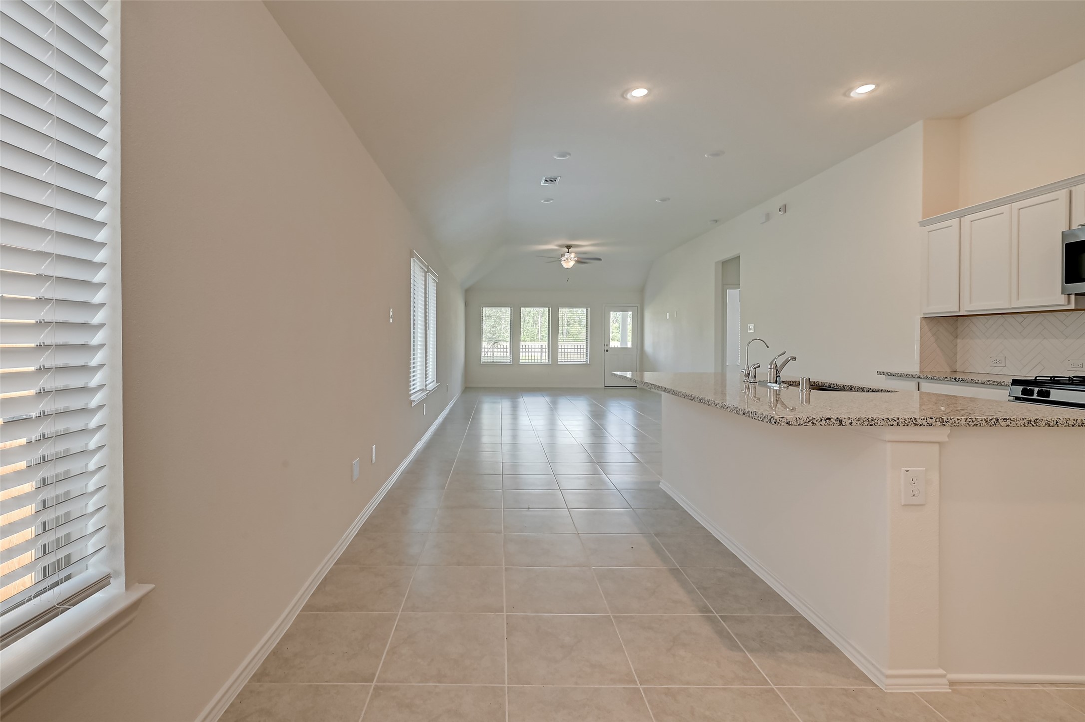 3106 Rising Fir Lane Conroe, TX 77385 - Photo 3 of 32 a view of a kitchen with kitchen