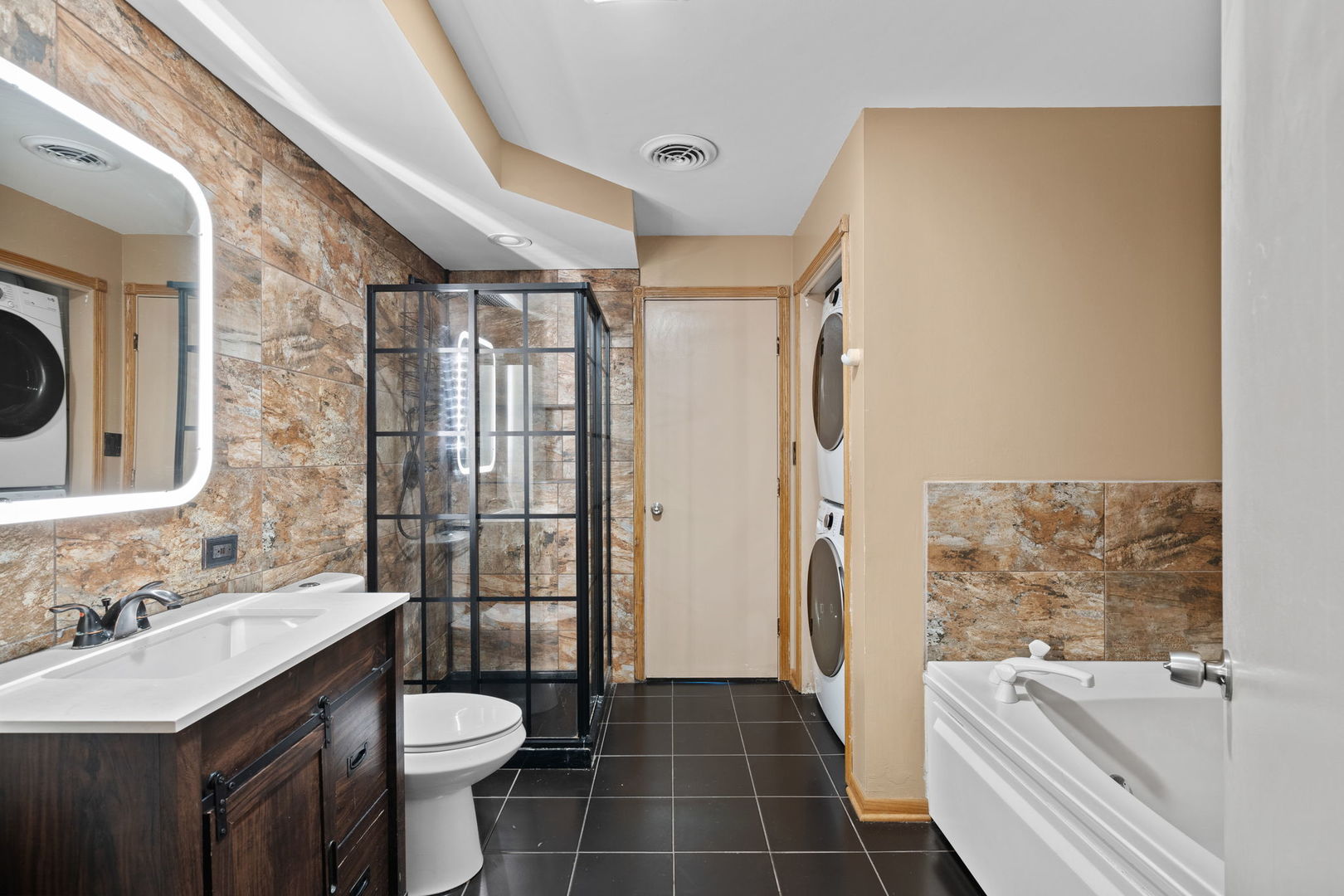 6337 Roosevelt Road, Unit 208 Berwyn, IL 60402 - Photo 6 of 14 a bathroom with a sink toilet and shower