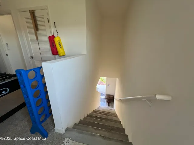a view of a hallway with closet